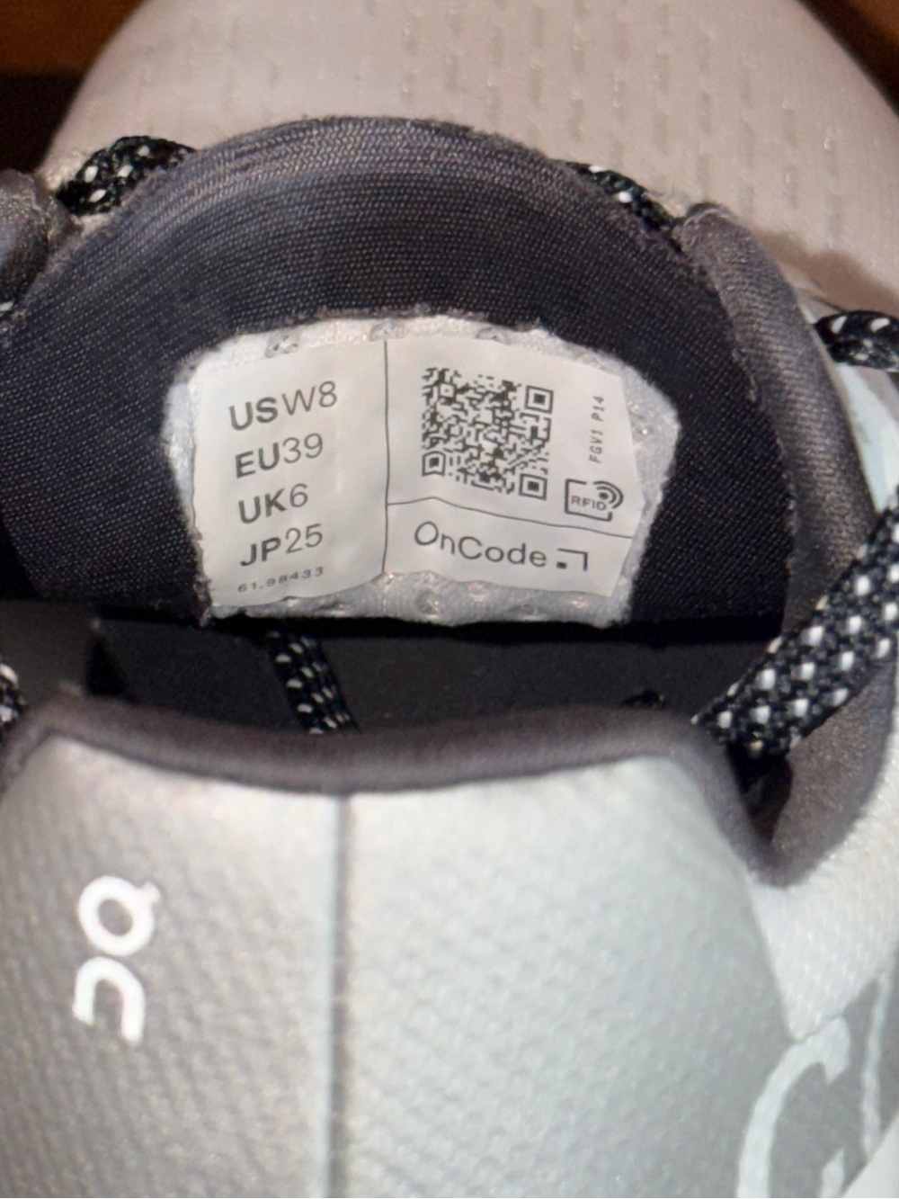 On Running Women's Athletic Sneakers in Light Gray and White